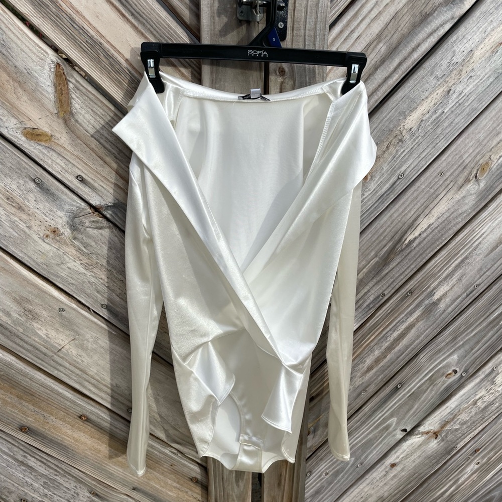Elegant White body suit never worn